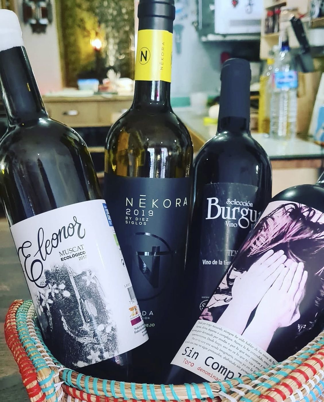 Bottles of Spanish wine in a woven basket